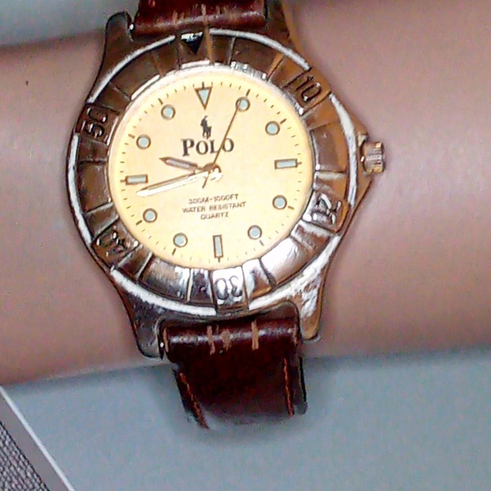 Gold face Polo watch